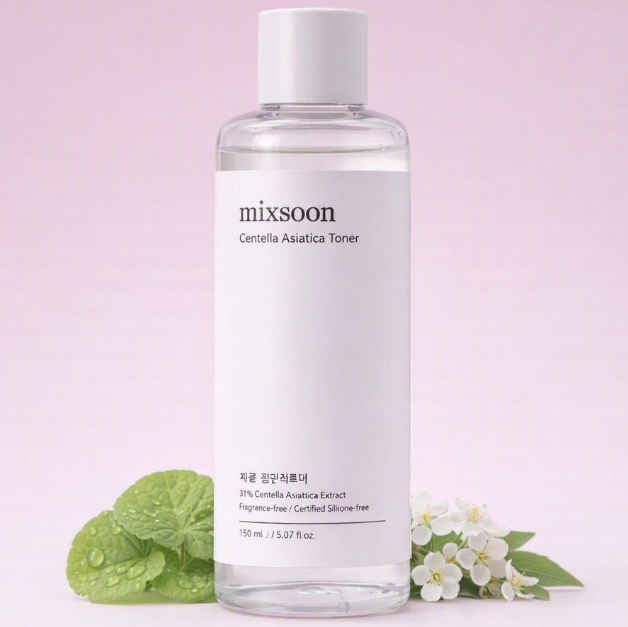 A 150 ml bottle of mixsoon Centella Asiatica Toner, featuring a white label and white cap, styled with fresh green mint leaves and white flowers on a soft pink background.